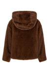 the herno bomber jacket redefines outerwear through a relaxed silhouette