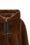 the herno bomber jacket redefines outerwear through a relaxed silhouette