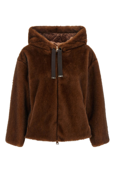 the herno bomber jacket redefines outerwear through a relaxed silhouette