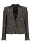 the tom ford jacket redefines the codes of formal tailoring through a shortened