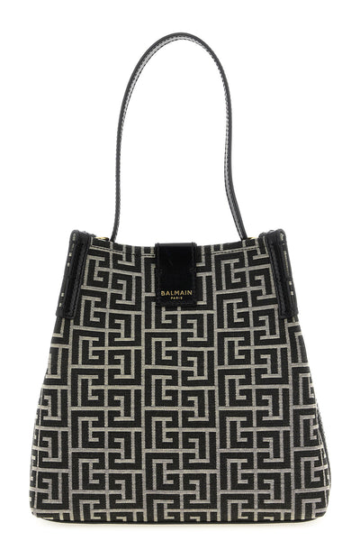 the balmain release bucket bag defines a structured silhouette through a compa