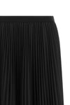 the fabiana filippi skirt defines a new elegance through fluid volumes and mater