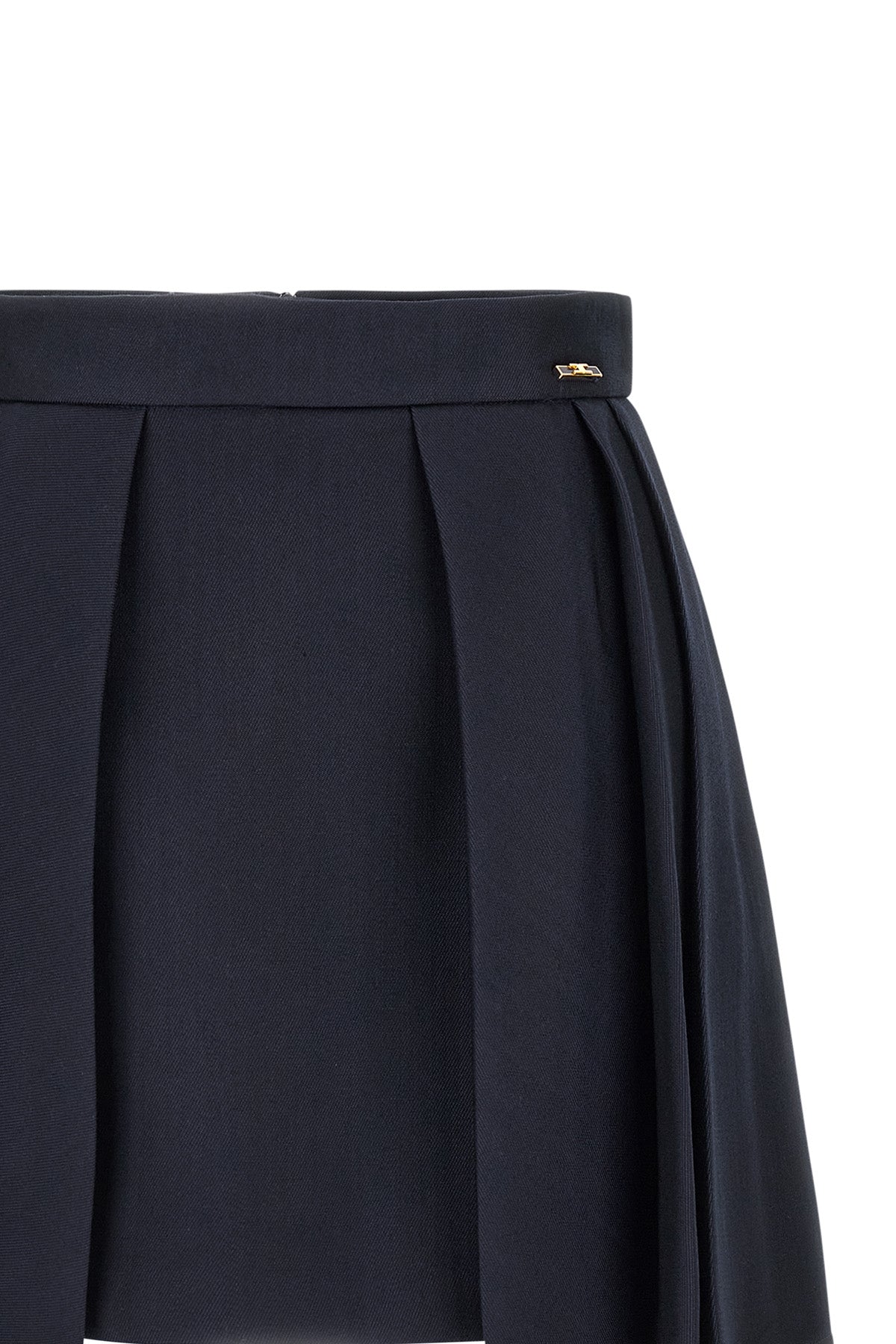 elisabetta franchi mini skirt defines the silhouette through a rigorous sartoria