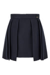 elisabetta franchi mini skirt defines the silhouette through a rigorous sartoria