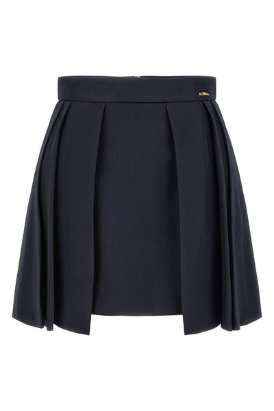 elisabetta franchi mini skirt defines the silhouette through a rigorous sartoria