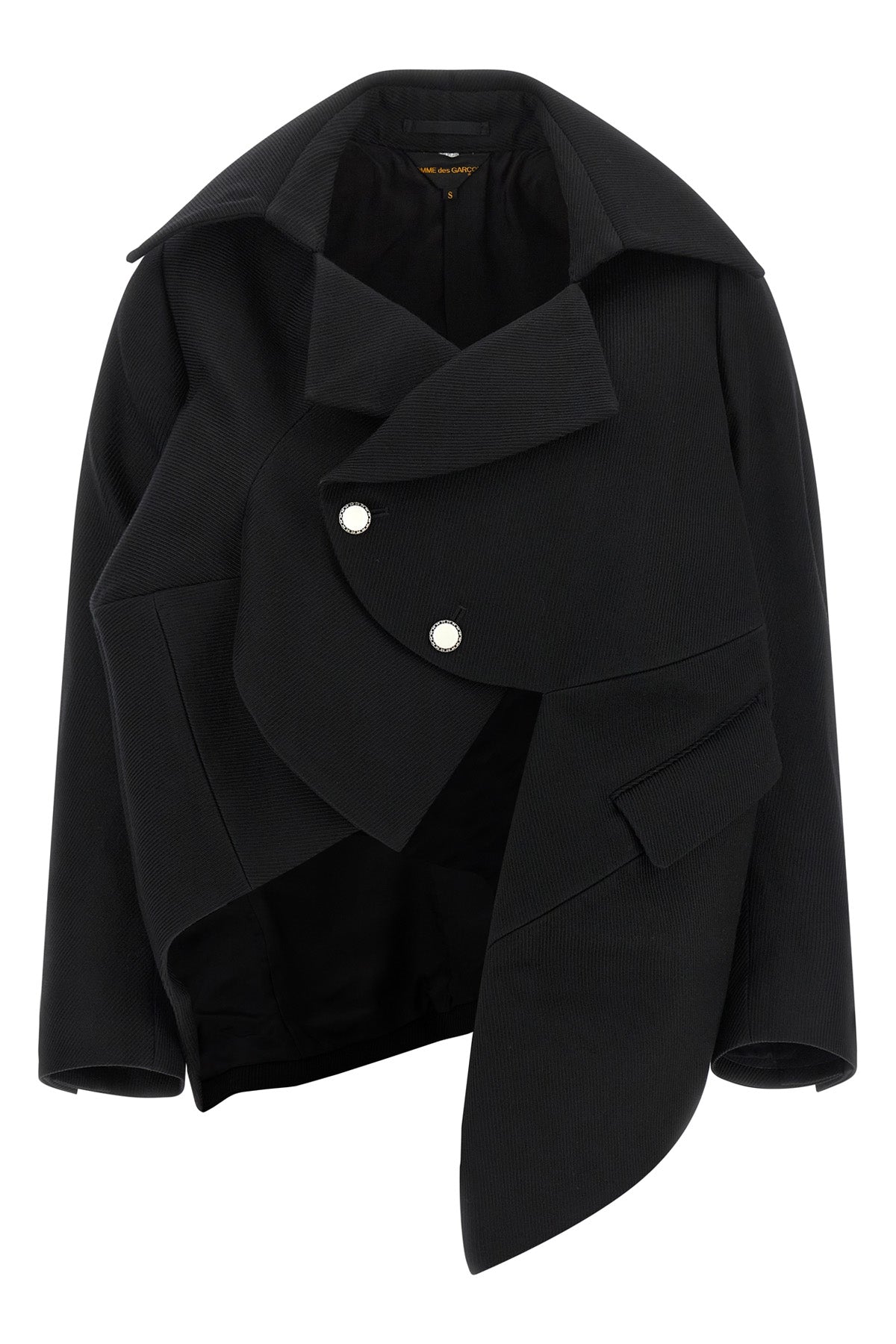 the comme des garçons blazer redefines traditional tailoring through an asymmetr