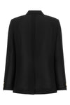 the comme des garçons single-breasted blazer redefines classic tailoring through
