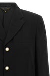 the comme des garçons single-breasted blazer redefines classic tailoring through