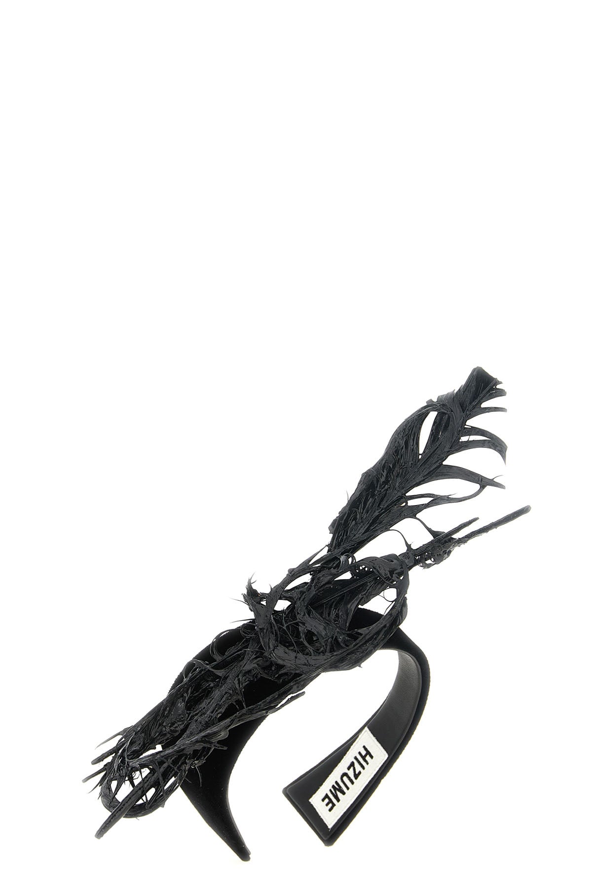 the comme des garcons headband redefines the accessory through an avant-garde ae