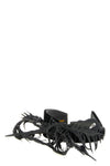 the comme des garcons headband redefines the accessory through an avant-garde ae