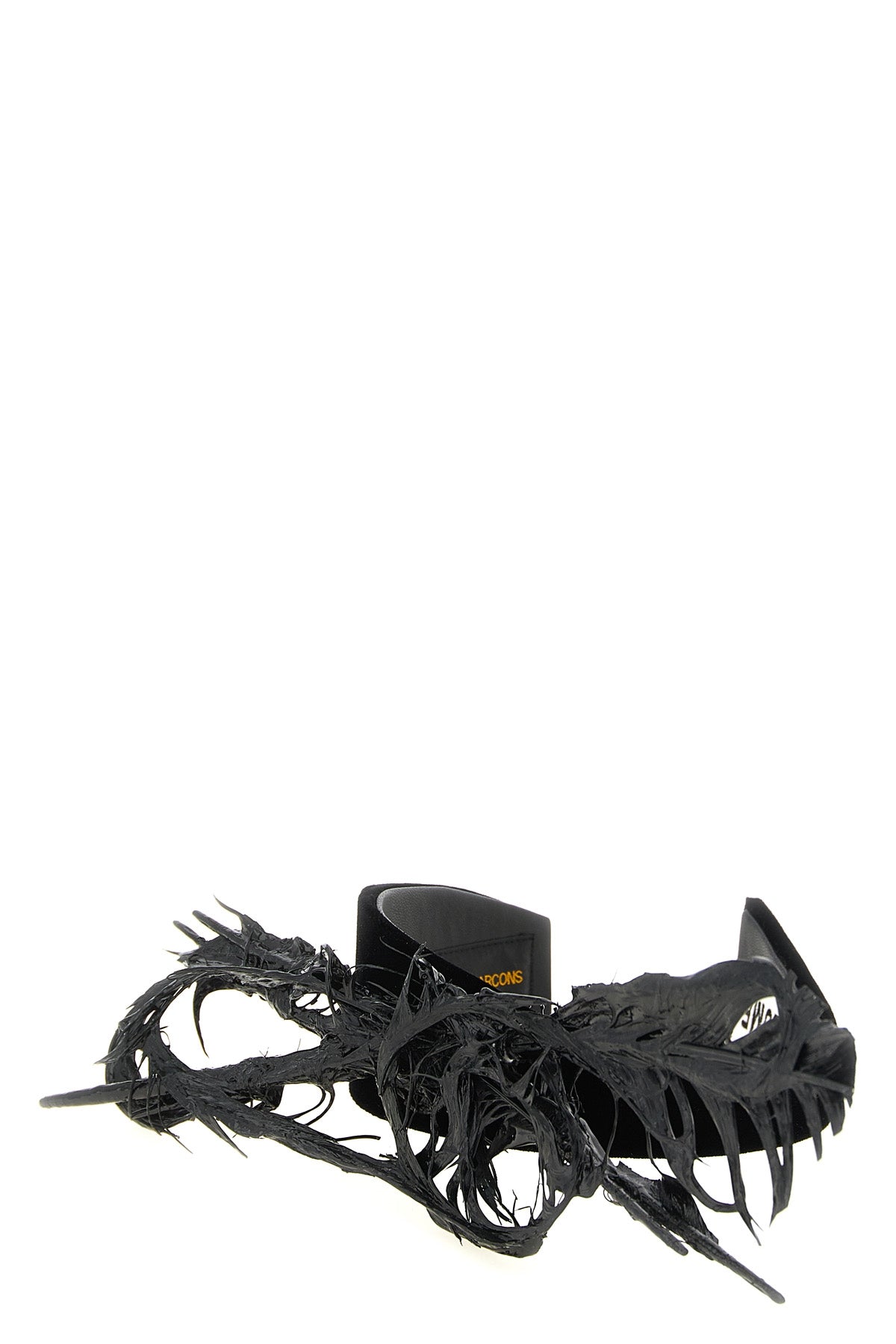 the comme des garcons headband redefines the accessory through an avant-garde ae
