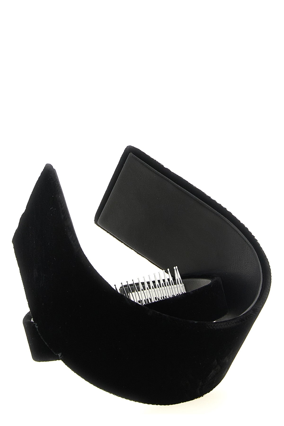 the comme des garcons headband is distinguished by an asymmetrical and sculptura