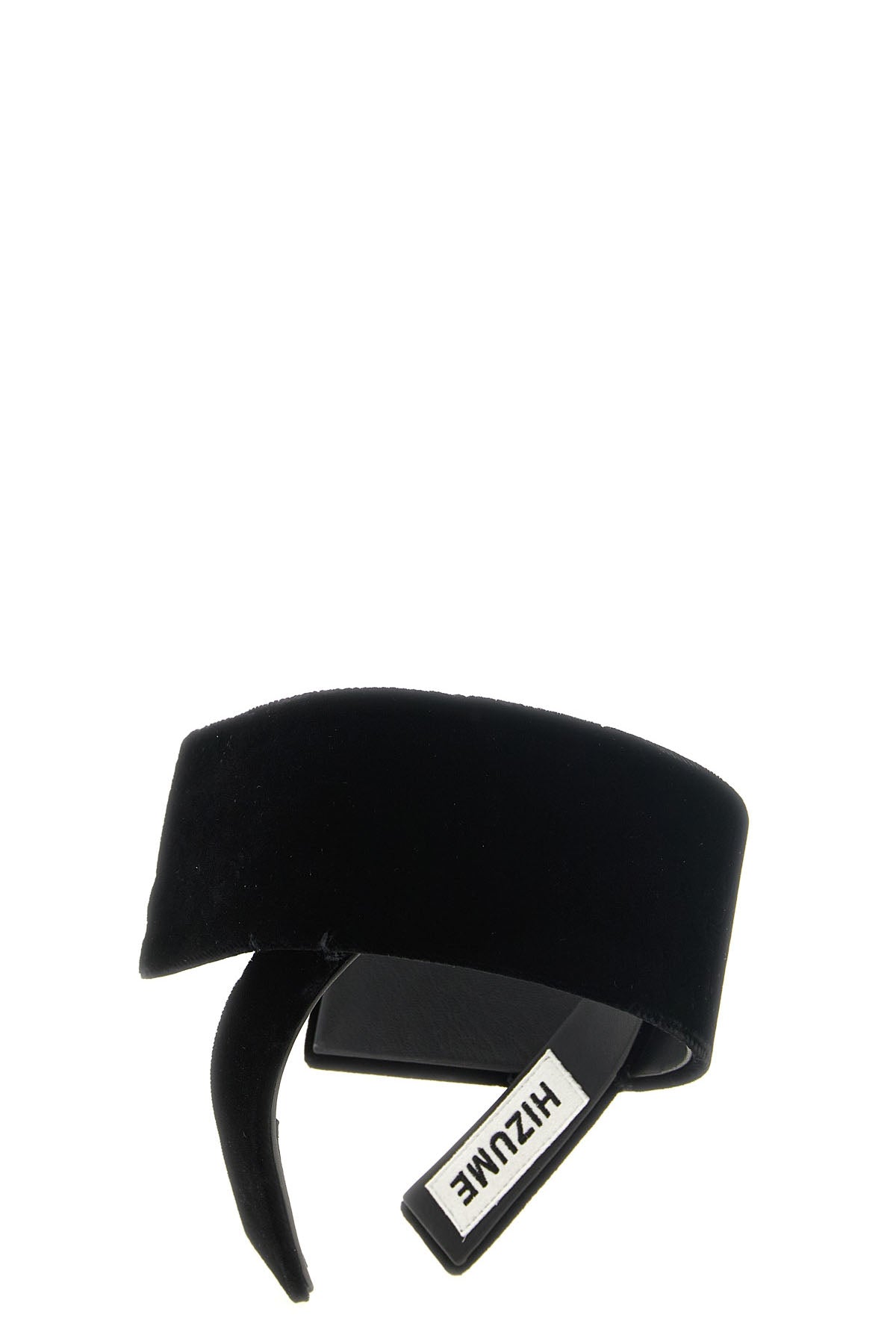 the comme des garcons headband is distinguished by an asymmetrical and sculptura