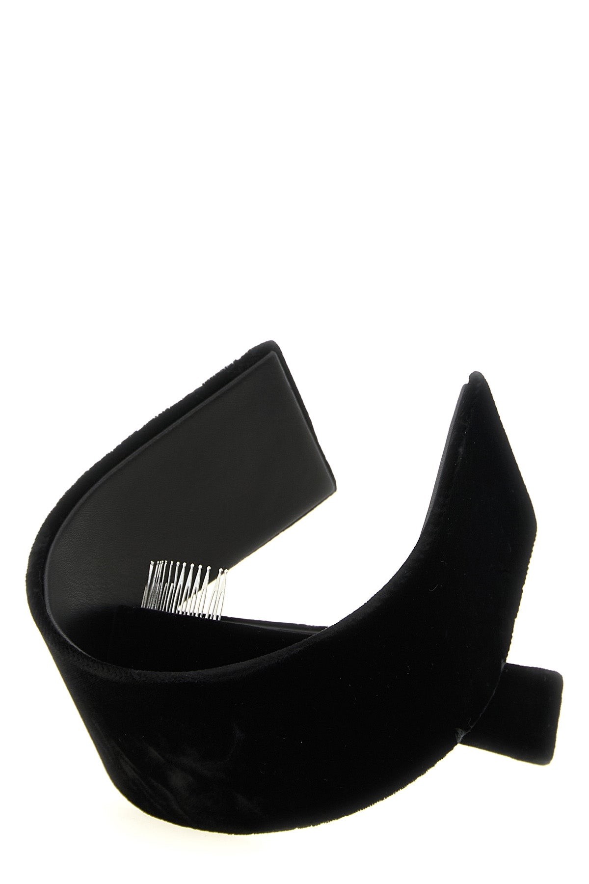 the comme des garcons headband is distinguished by an asymmetrical and sculptura