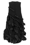 the comme des garçons mini dress redefines volumes through an avant-garde archit