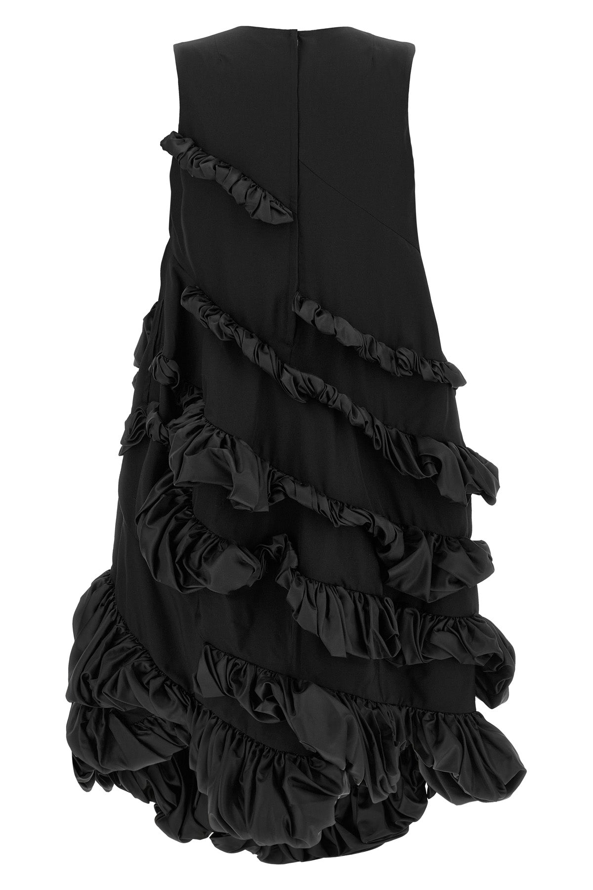 the comme des garçons mini dress redefines volumes through an avant-garde archit