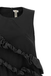 the comme des garçons mini dress redefines volumes through an avant-garde archit