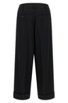 the comme des garçons trousers redefine the codes of contemporary tailoring thro