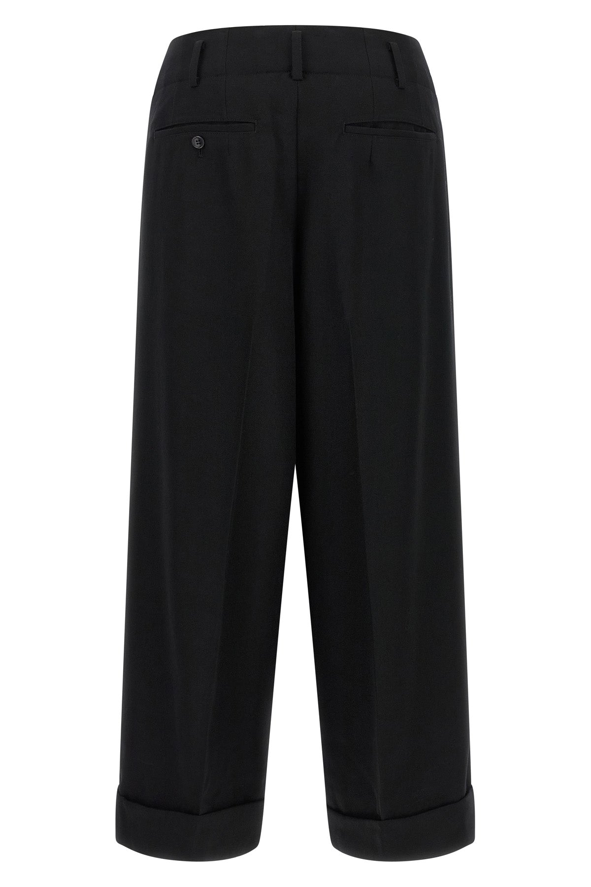 the comme des garçons trousers redefine the codes of contemporary tailoring thro