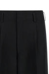the comme des garçons trousers redefine the codes of contemporary tailoring thro