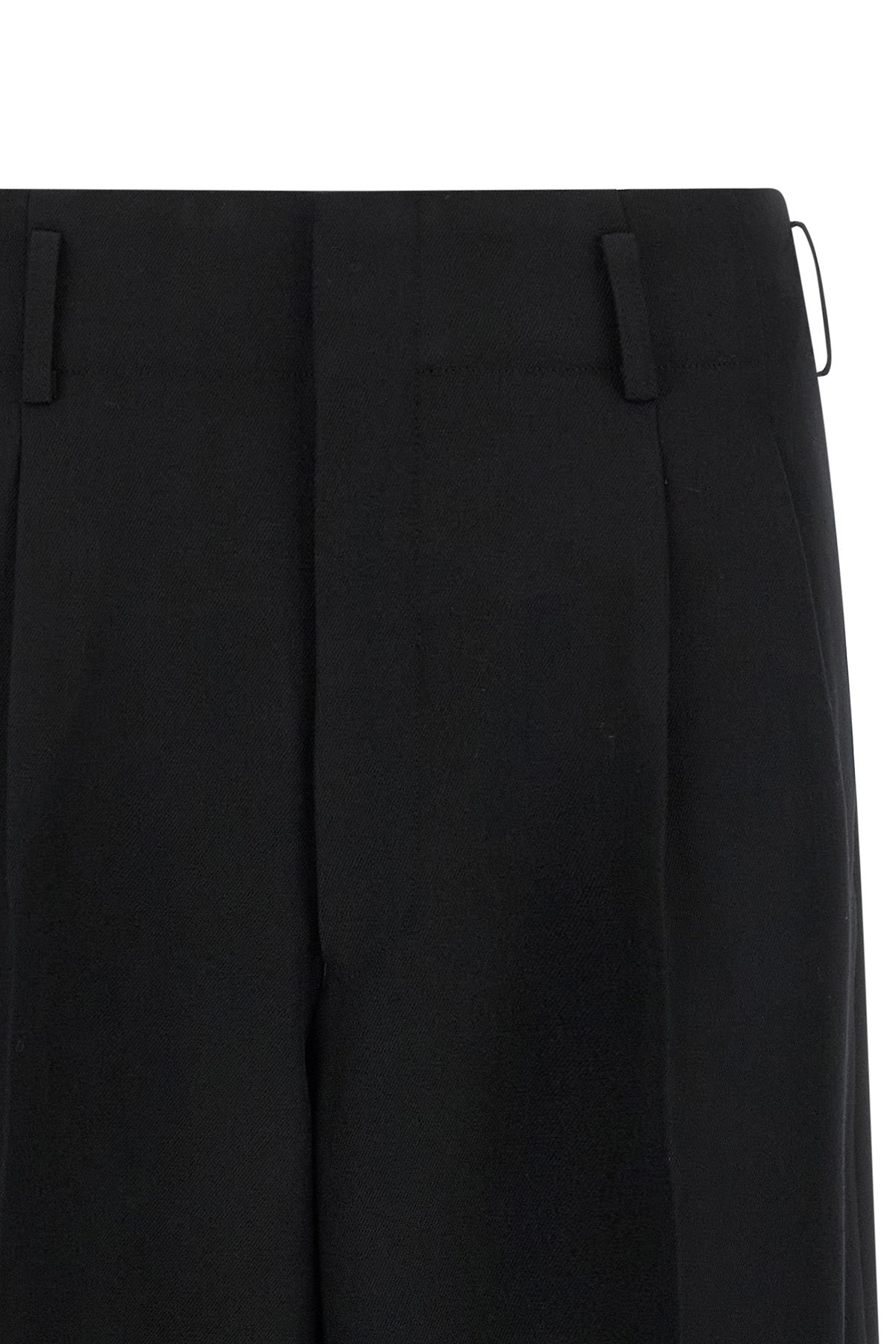 the comme des garçons trousers redefine the codes of contemporary tailoring thro