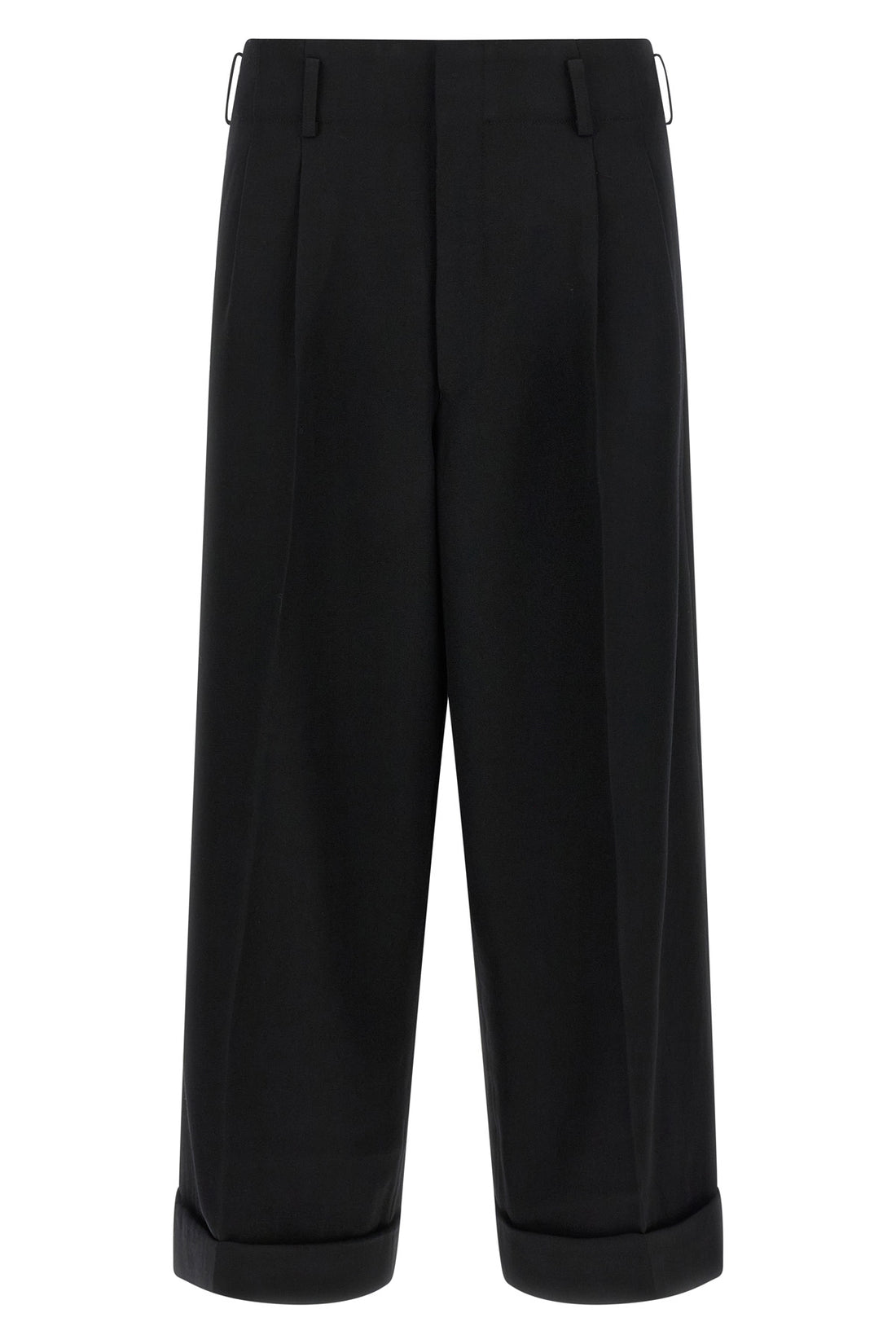 COMME DES GARÇONS M the comme des garçons trousers redefine the codes of contemporary tailoring thro