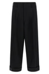 the comme des garçons trousers redefine the codes of contemporary tailoring thro