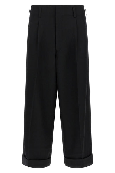 the comme des garçons trousers redefine the codes of contemporary tailoring thro