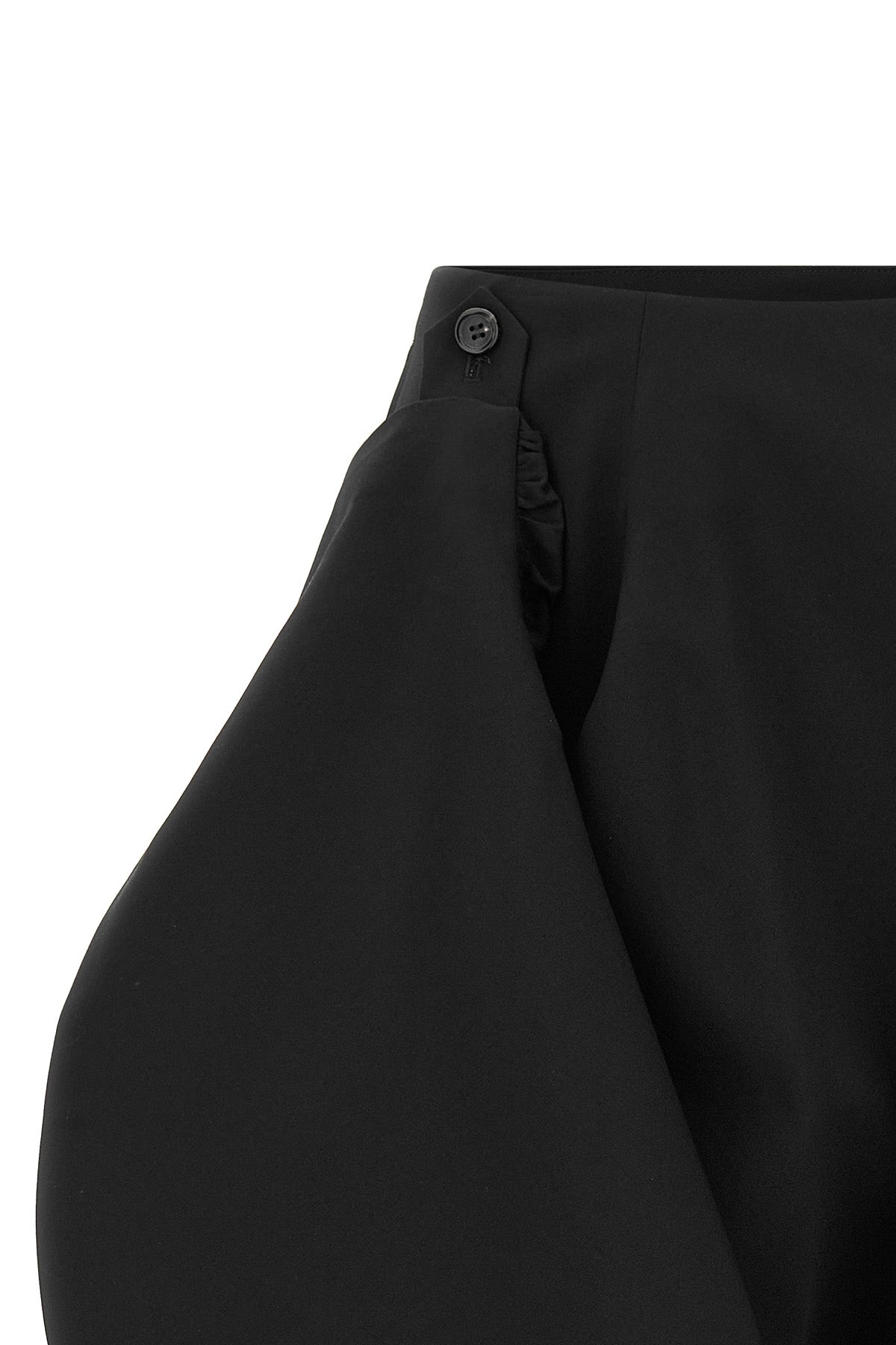 the sculptural skirt comme des garçons redefines the codes of tailoring through