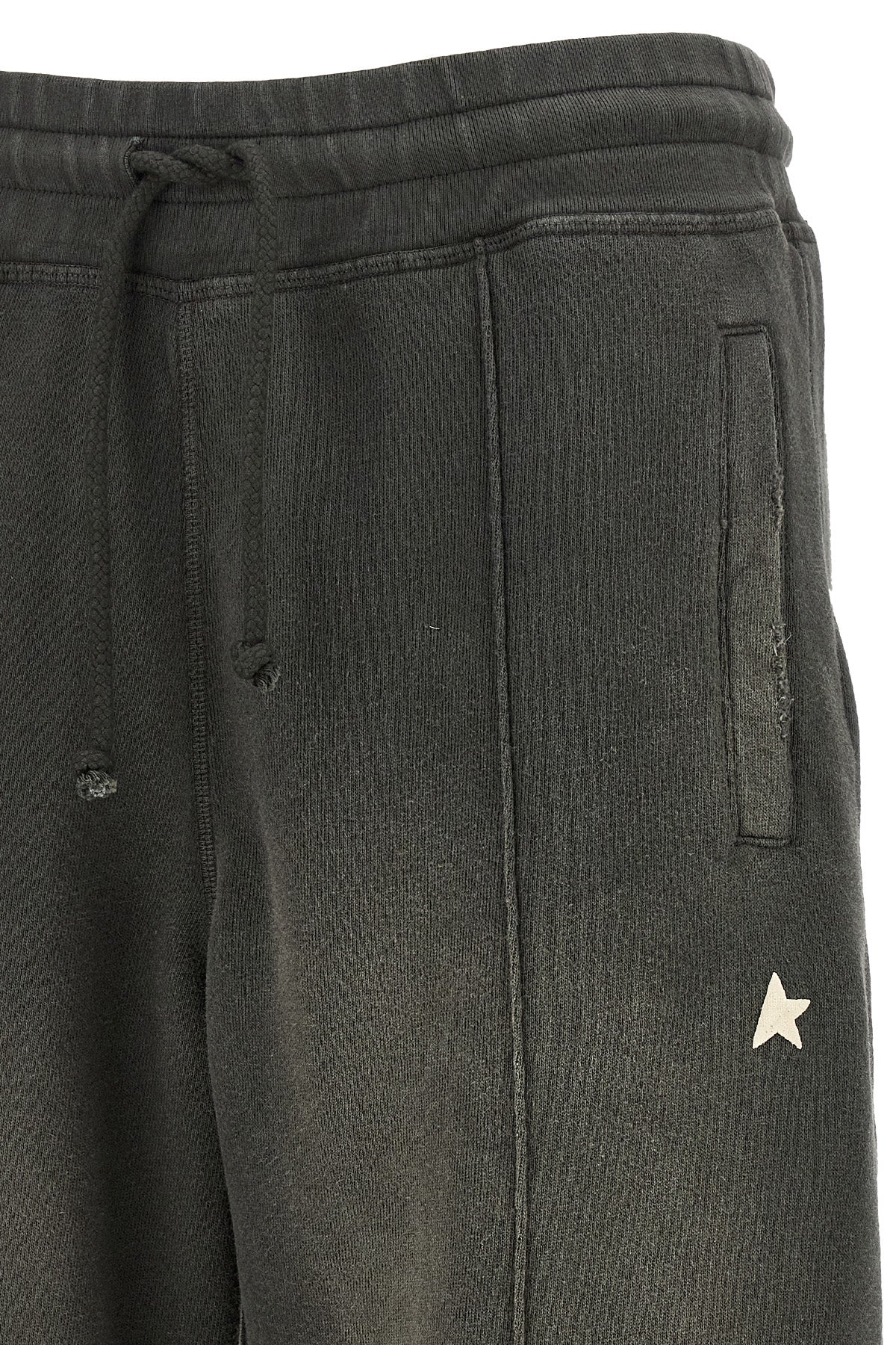 golden goose star track pants redefine casual wear through meticulous sartoria