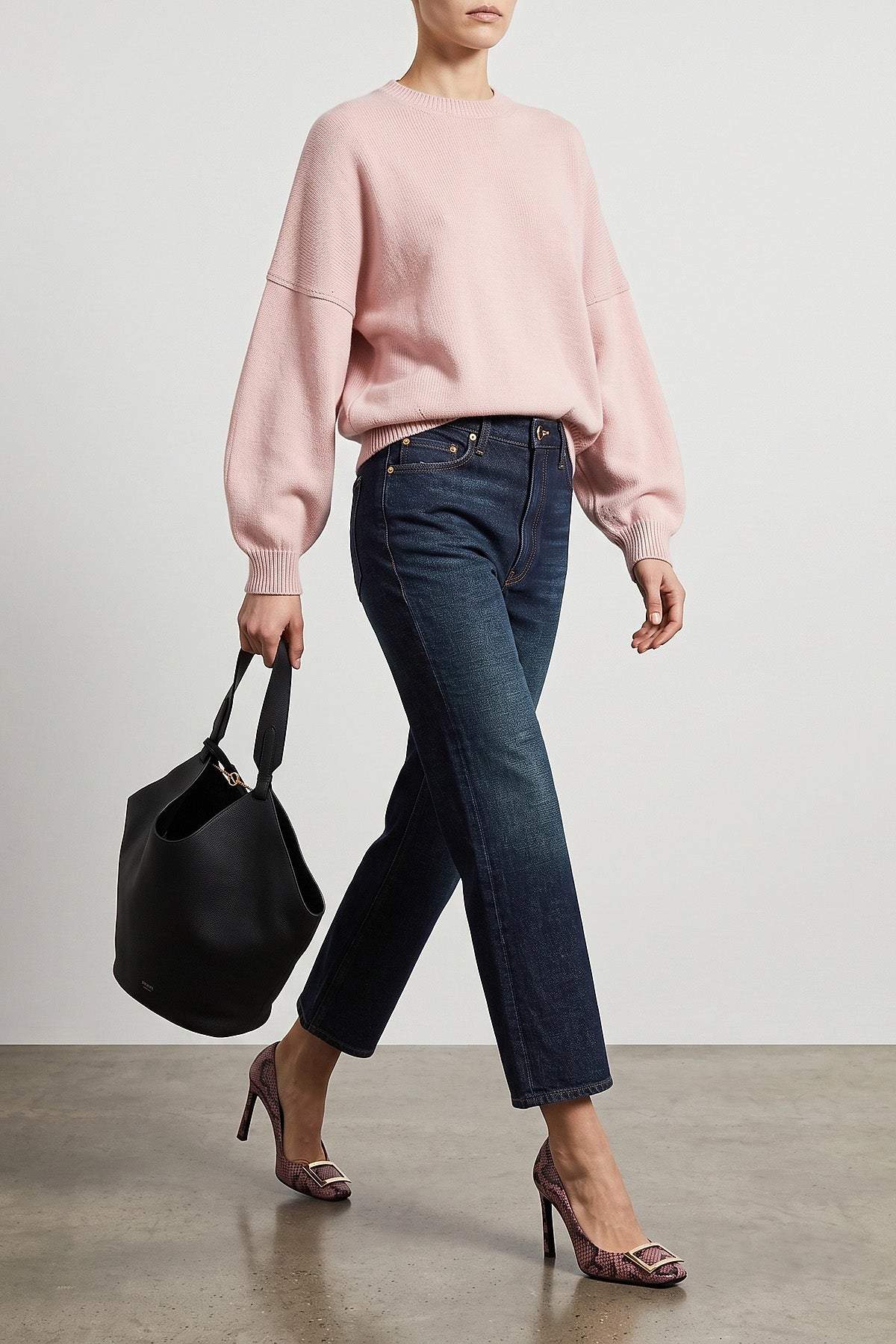 the khaite lotus midi tote bag redefines everyday volumes through a deconstruc