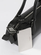 ALAÏA OS woman&