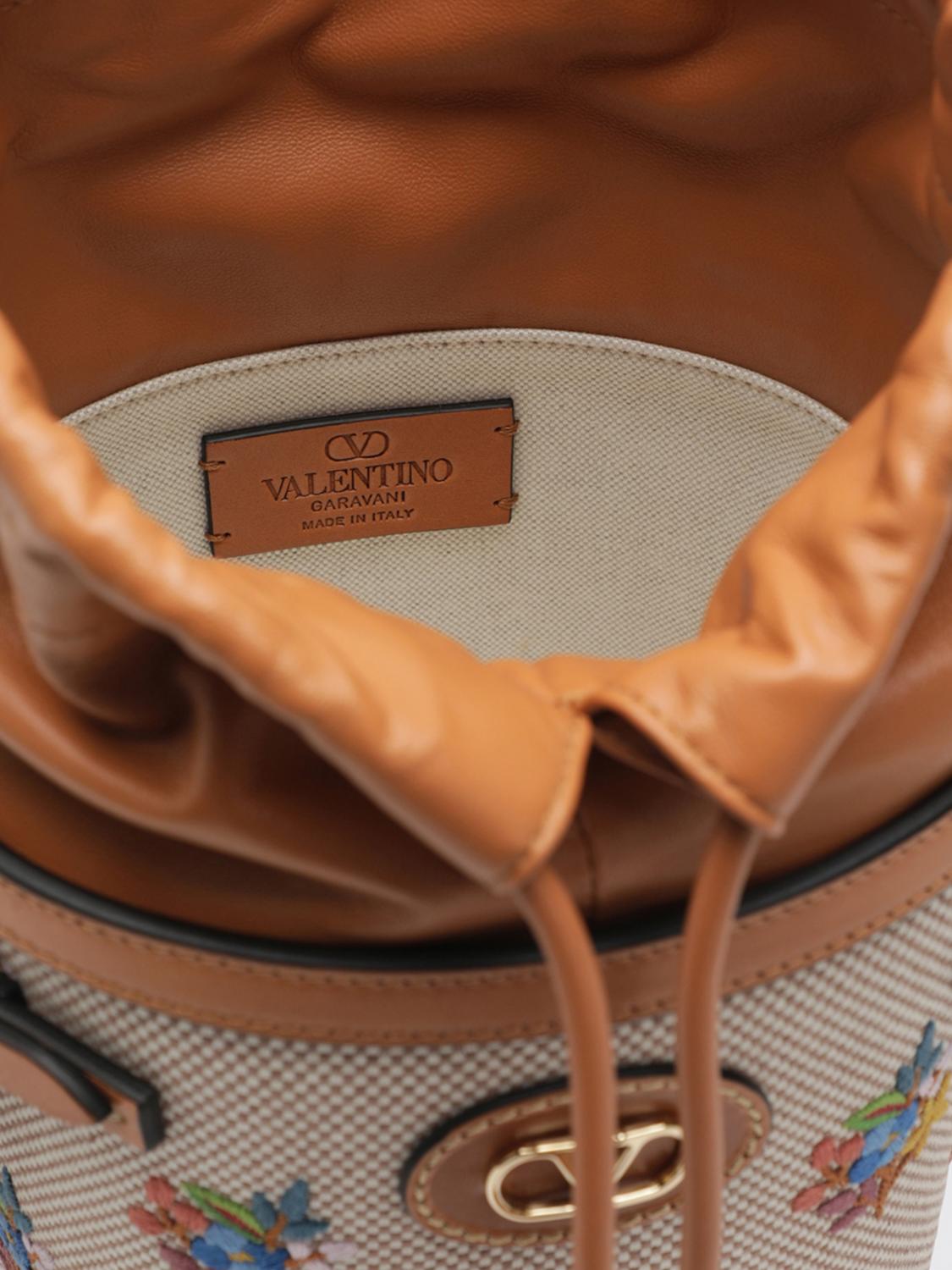 vlogo signature canvas bucket bag with jacquard flowers and leather
