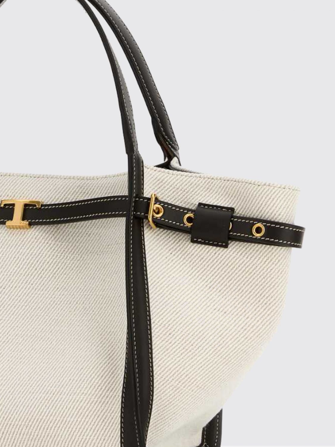 t timeless denim and leather bag