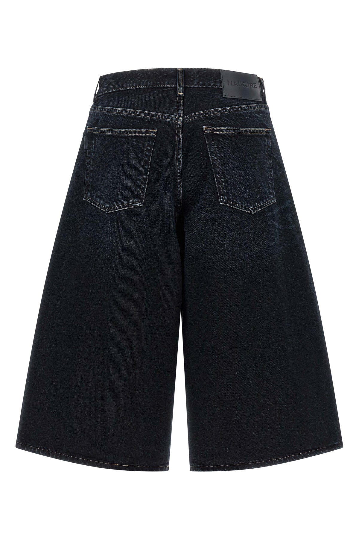 haikure legacy denim bermuda shorts redefine the volumes of the contemporary w