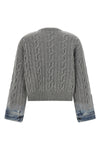 the karine pollock haikure knit redefines traditional knitwear through a bold
