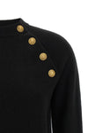the balmain crew neck sweater sets a new standard in contemporary knitwear