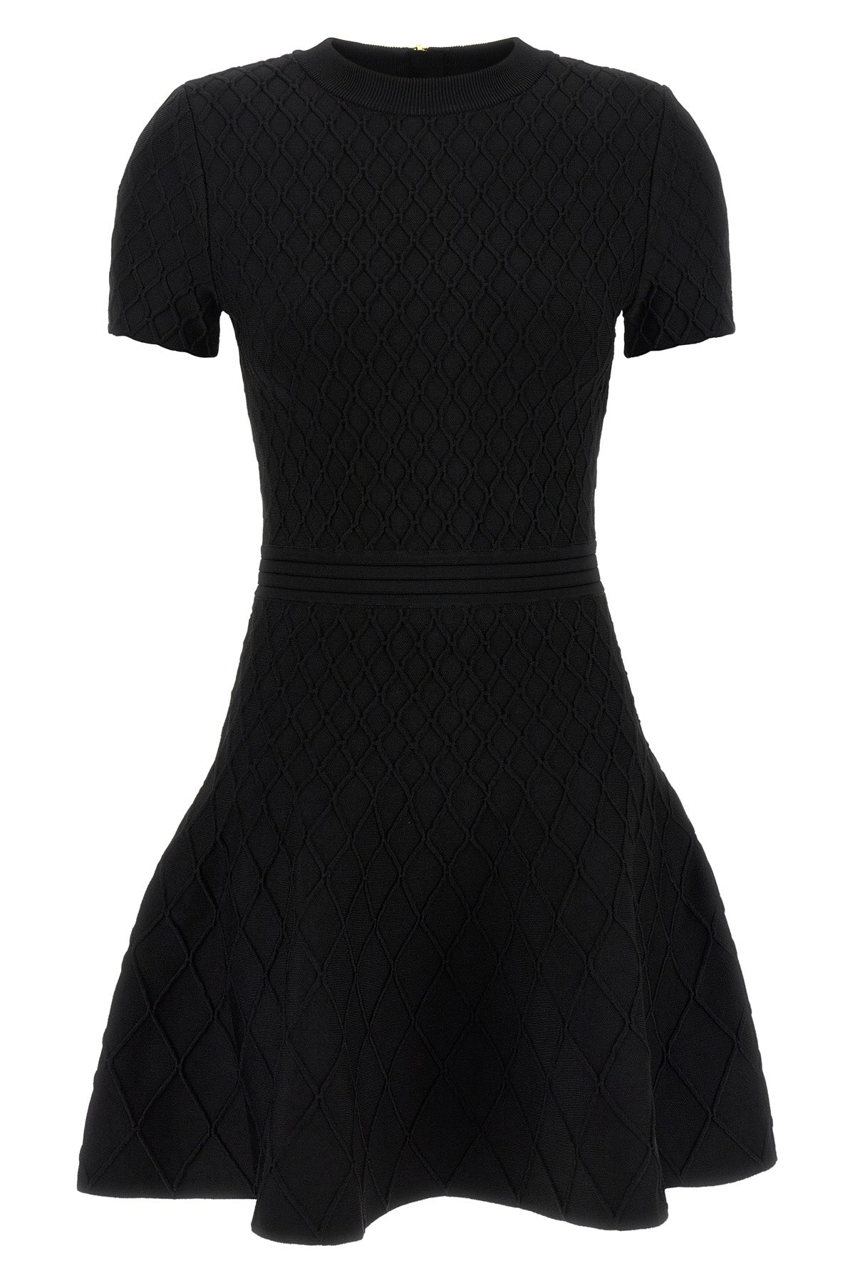 the flared balmain skater dress redefines knitwear codes through an hourglass