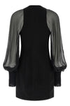 the balmain black mini dress redefines the codes of elegance through a sophistic