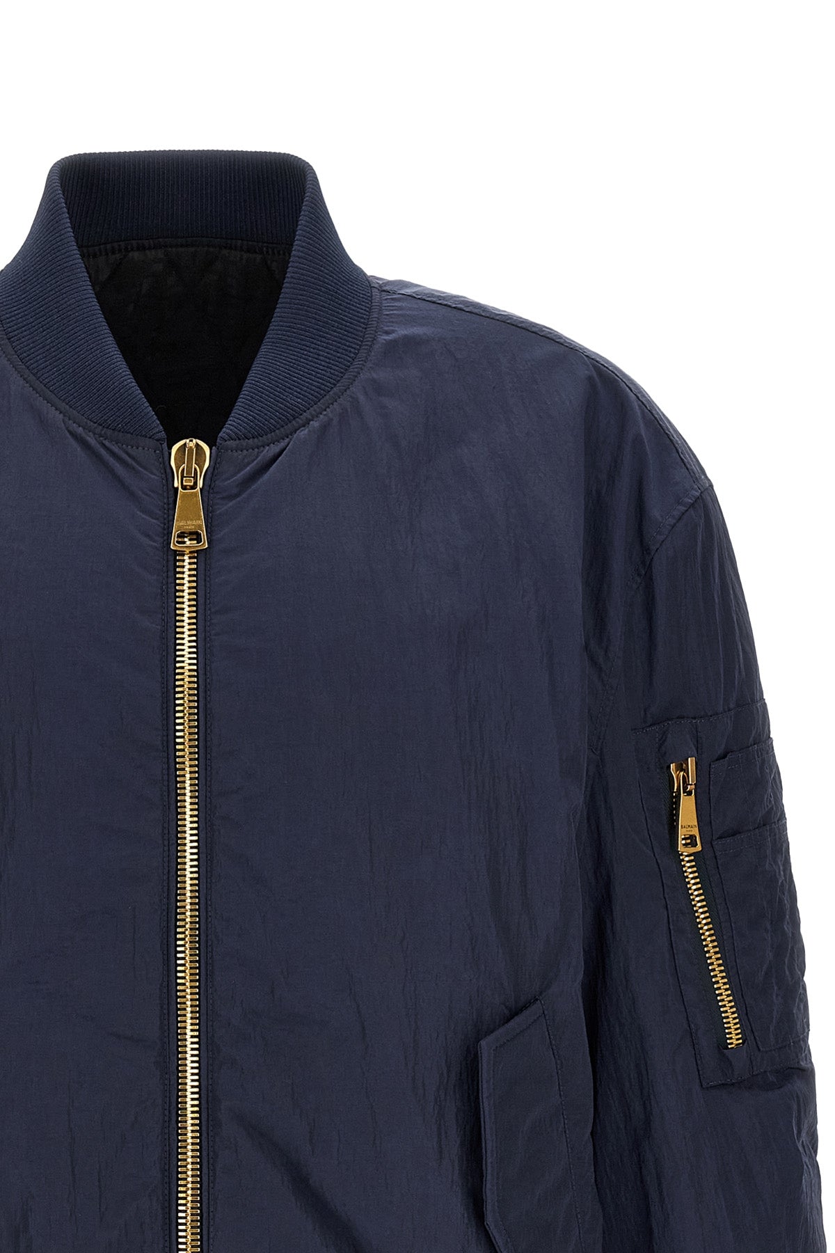 the balmain bomber jacket defines a relaxed silhouette through wide volumes and