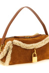the balmain small shoulder bag embodies a luxurious aesthetic through a clever p
