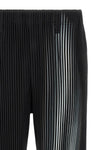 the homme plissé in the shadow trousers
