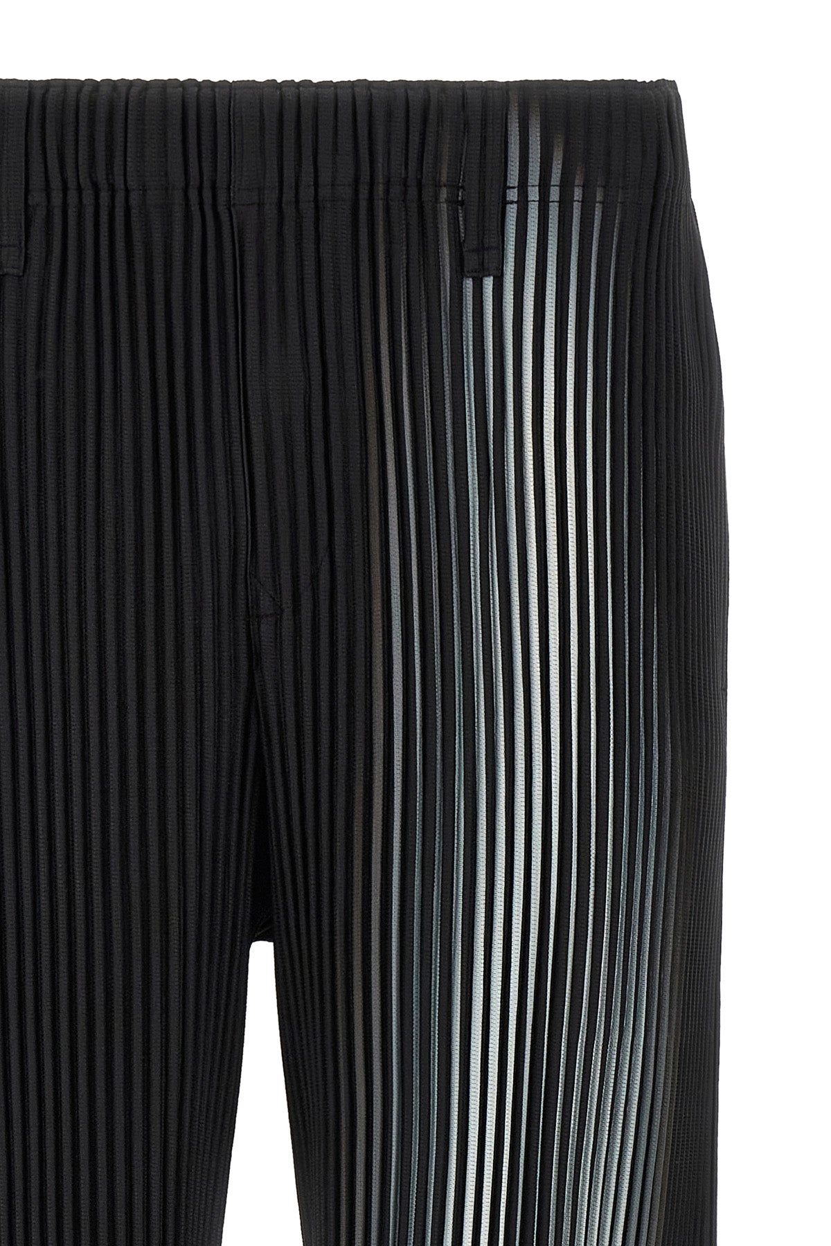 the homme plissé in the shadow trousers