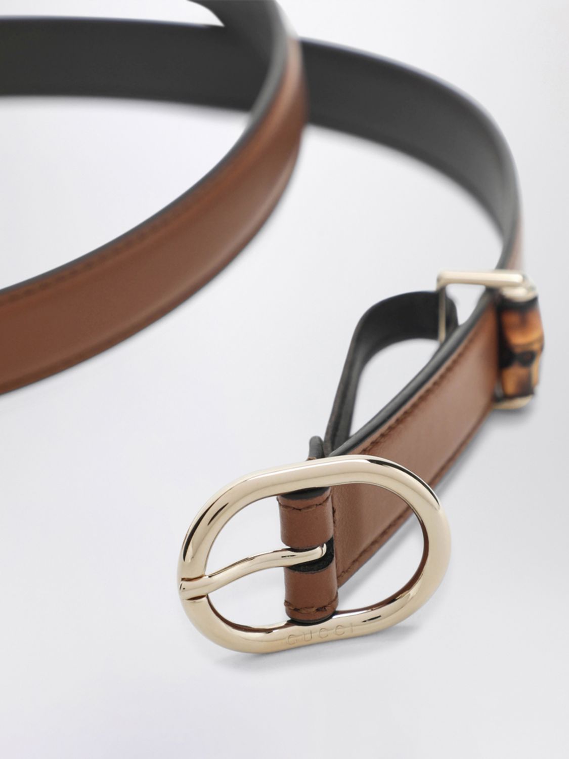 leather belt with oval buckle