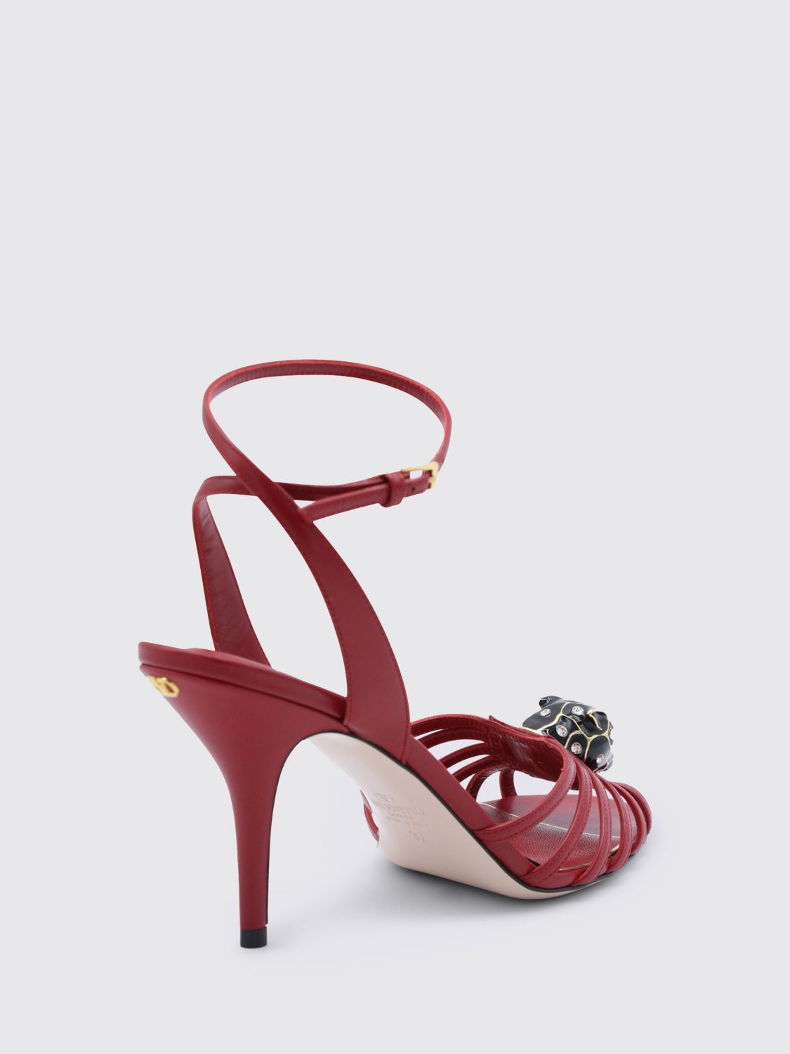 leather sandal with enamelled application pas de chat