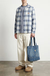 denim tote shopping bag in heavy cotton denim subjected to destroyed and used-