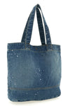 denim tote shopping bag in heavy cotton denim subjected to destroyed and used-