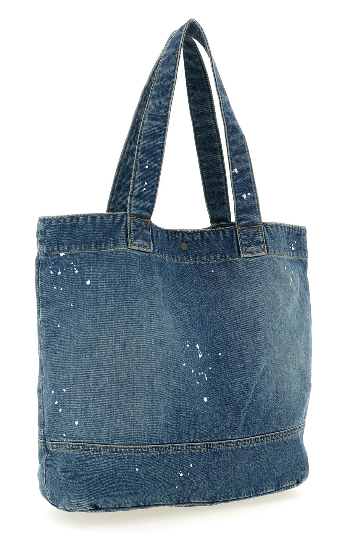 denim tote shopping bag in heavy cotton denim subjected to destroyed and used-