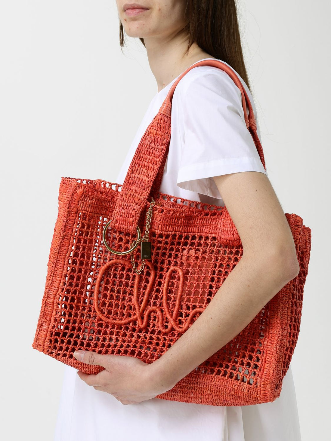 CHLOÉ OS summer banana perforated raffia bag chloé