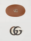 set of 2 metal and leather hair clips